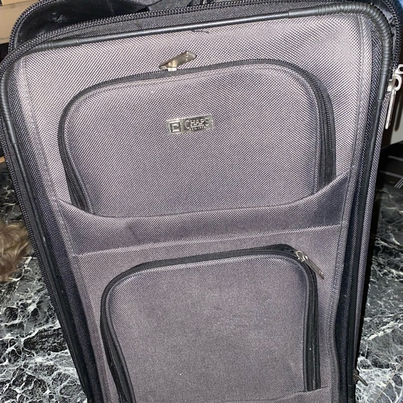 Lightly used CHAPS grey carry on roller bag. Grey interior. - Picture 1 of 5